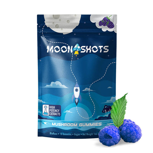 Moonshots Blue Raspberry mushroom gummies 10-count pouch front packaging with blueberry and rocket illustration.
